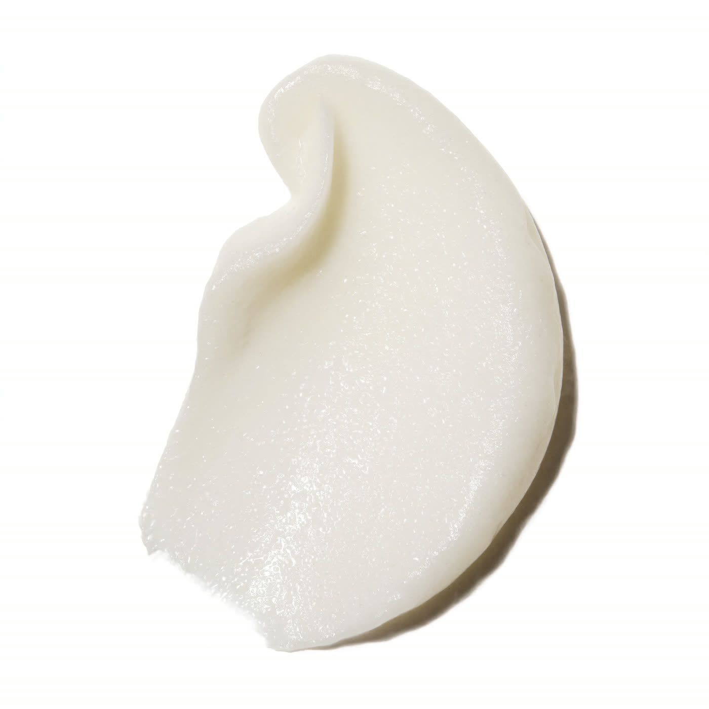 The texture of the cream, warmed between the fingers